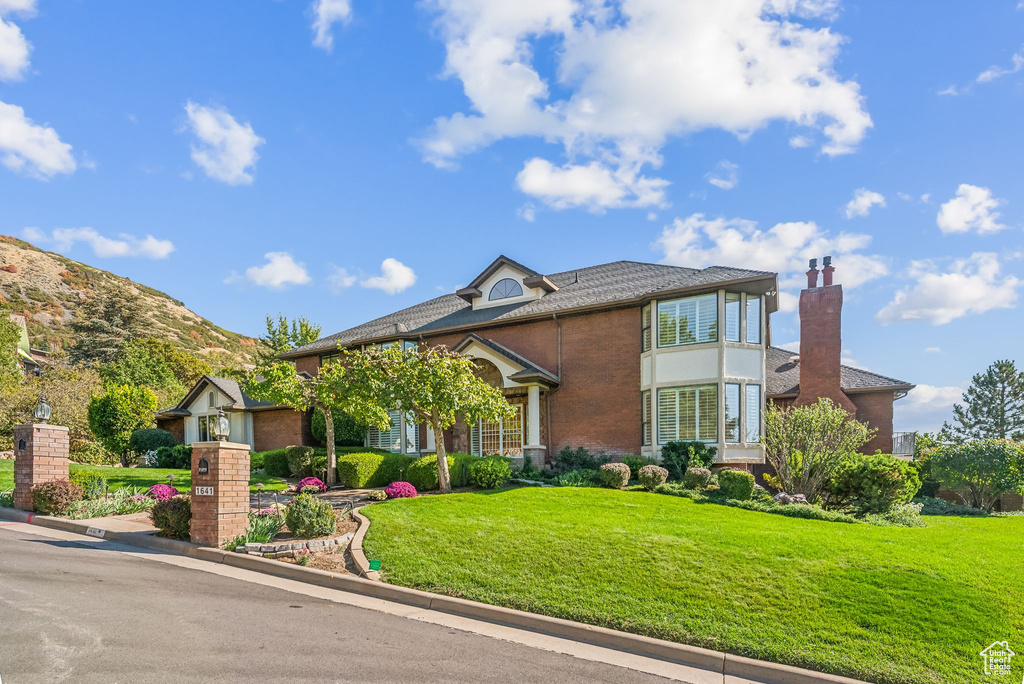 View of front of home with a front yard