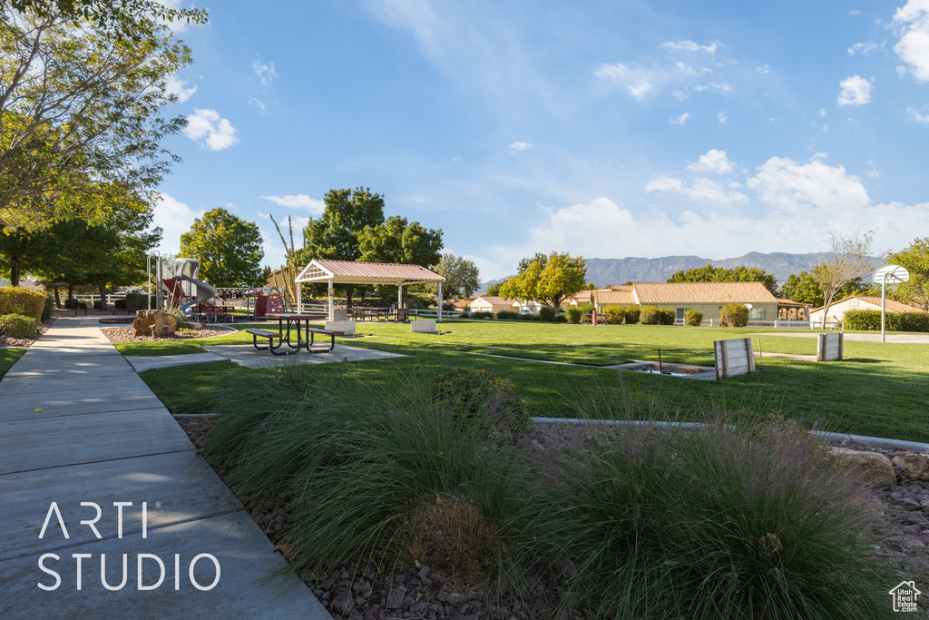 View of home's community featuring a gazebo, a yard, and a mountain view