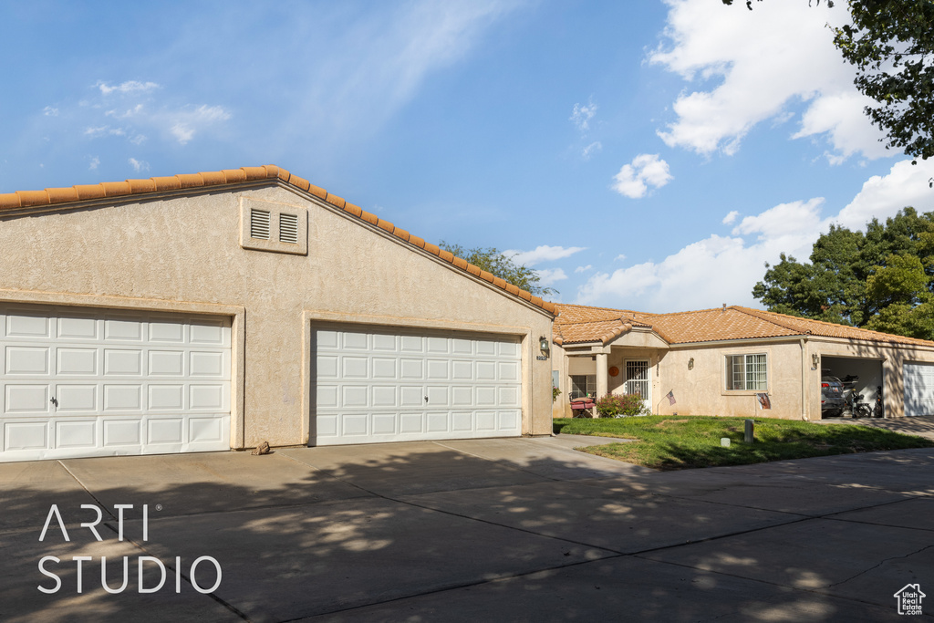 View of front of home with a garage