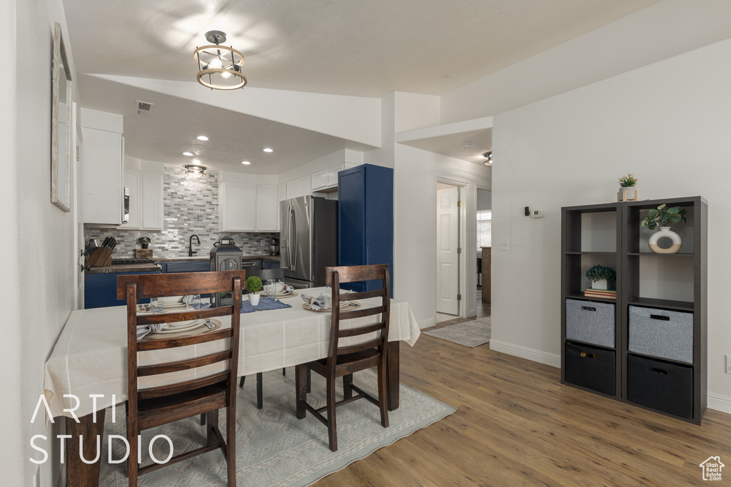 Dining space featuring wood-type flooring