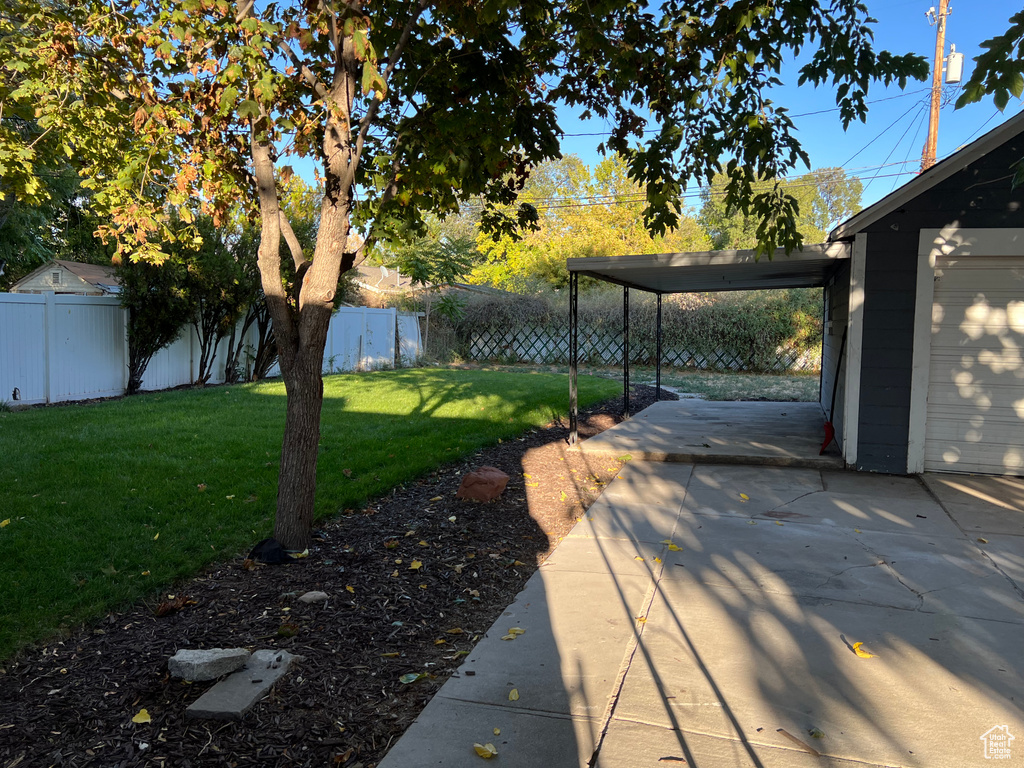 View of yard featuring a carport