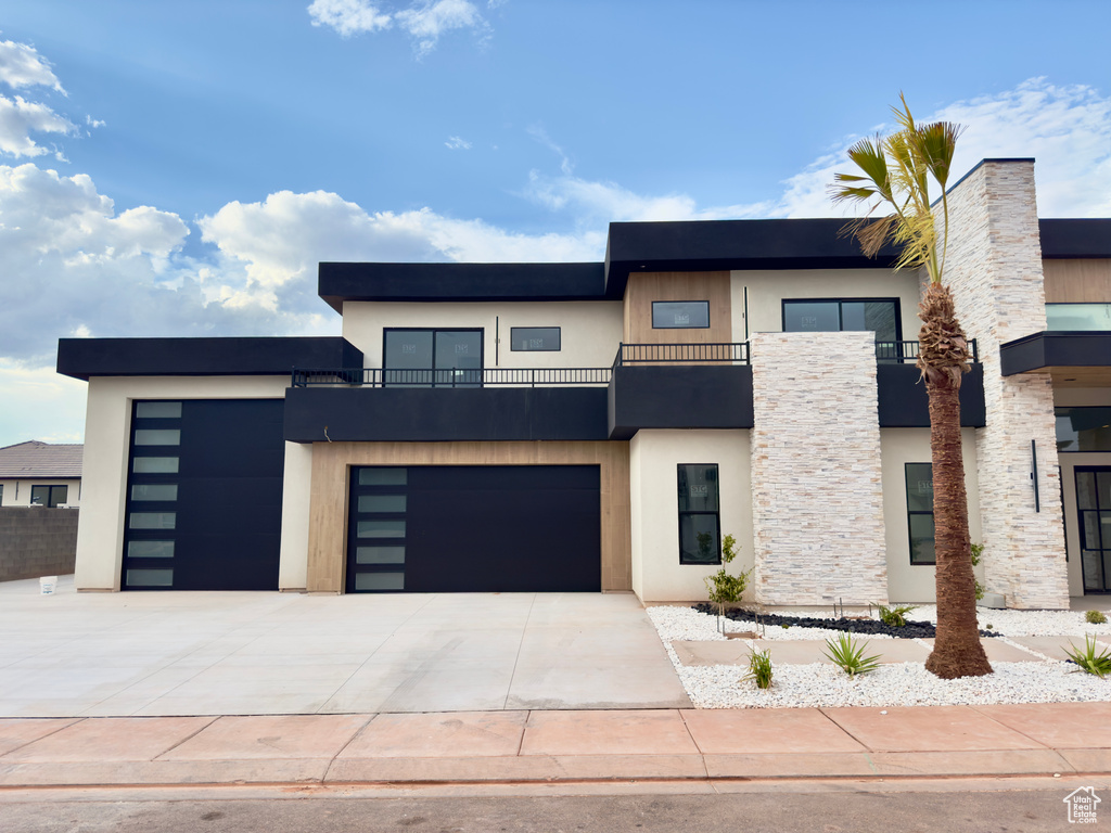 Modern home featuring a garage