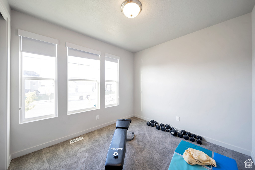 Workout room with carpet floors