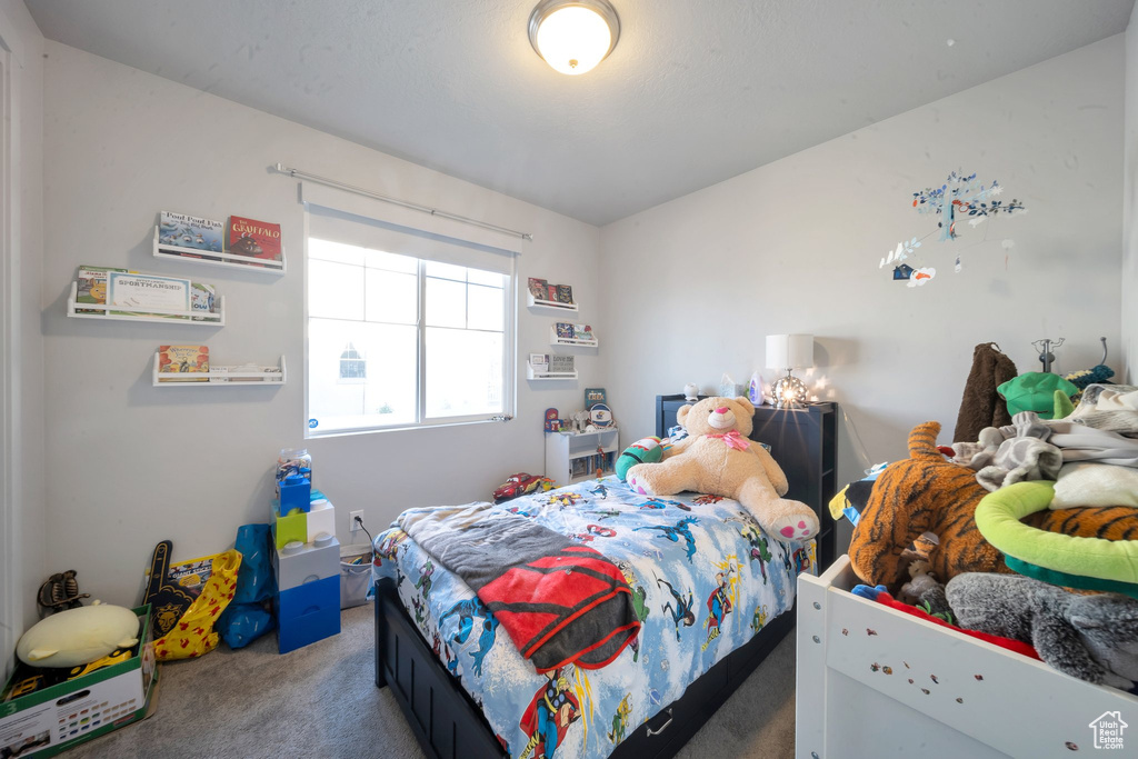 Bedroom featuring carpet floors