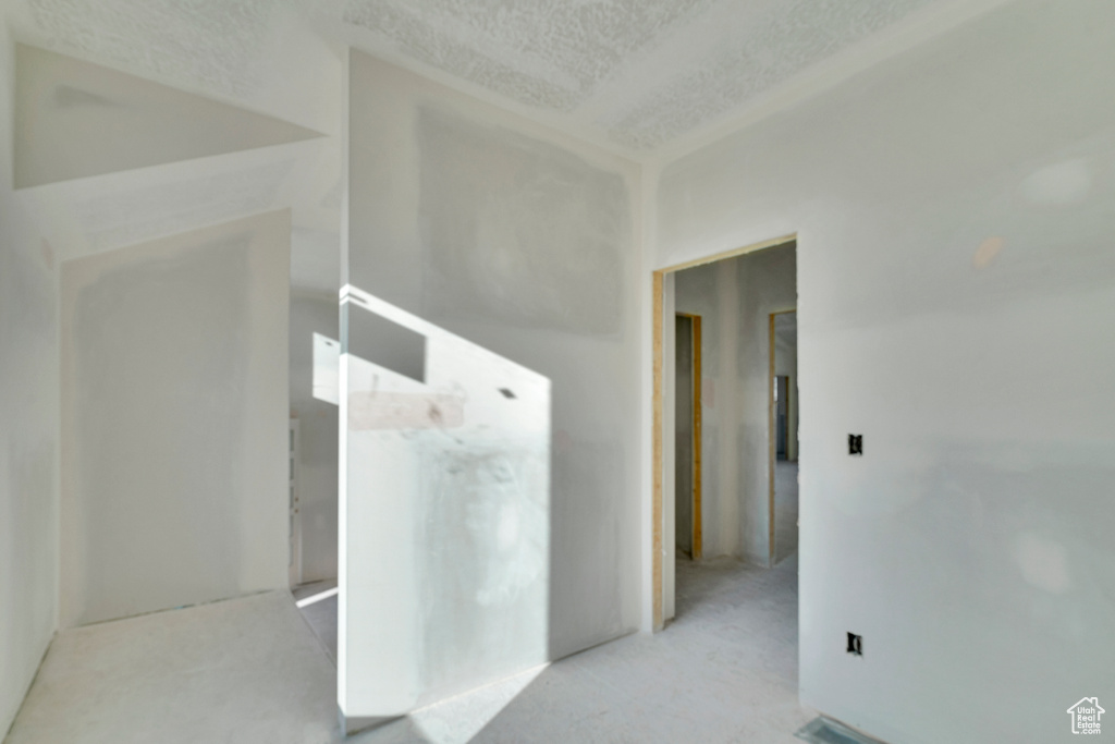 Spare room featuring a textured ceiling