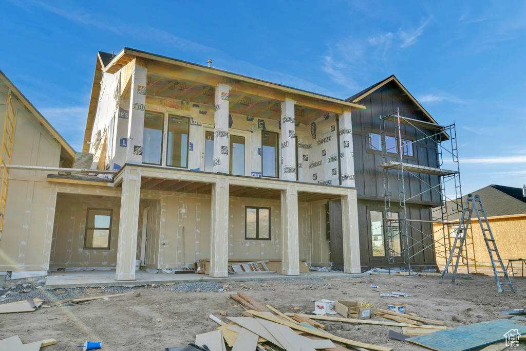 Exterior space featuring a balcony