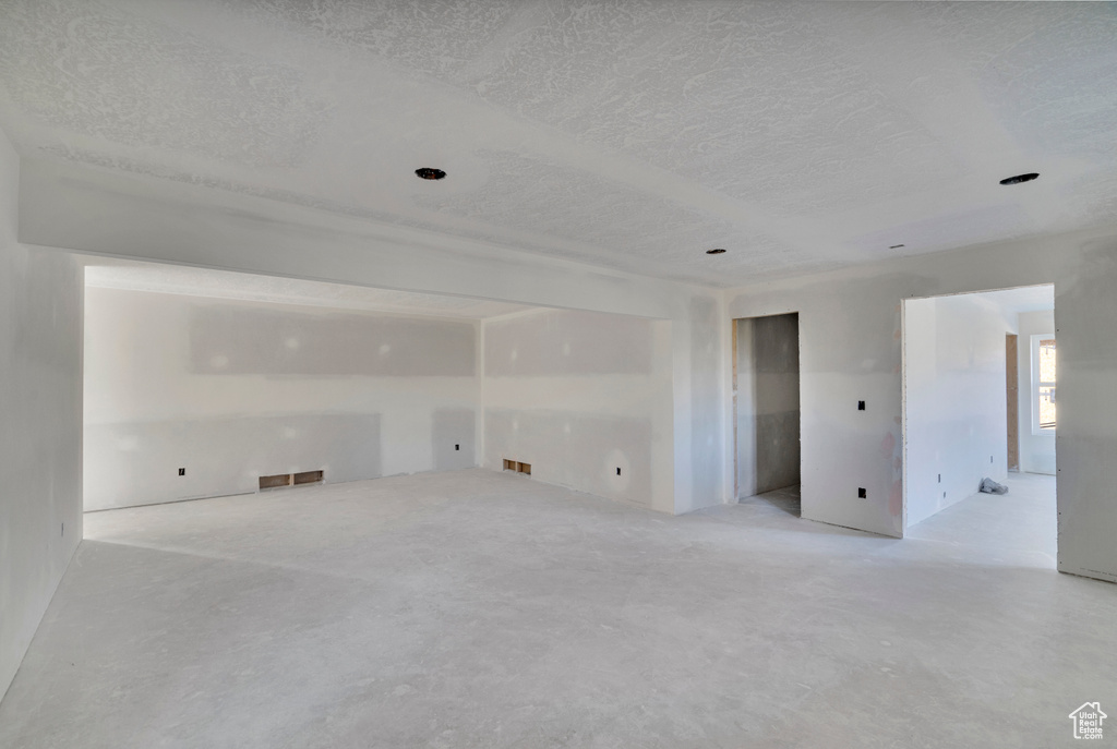 Spare room featuring a textured ceiling