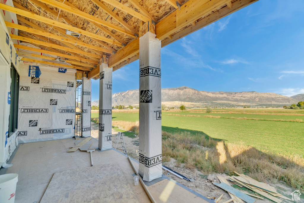 View of patio featuring a mountain view and a rural view