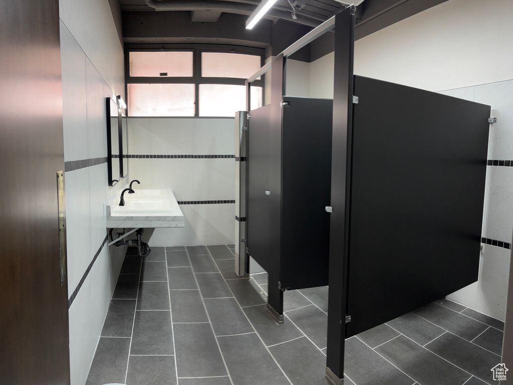 Bathroom with tile patterned floors