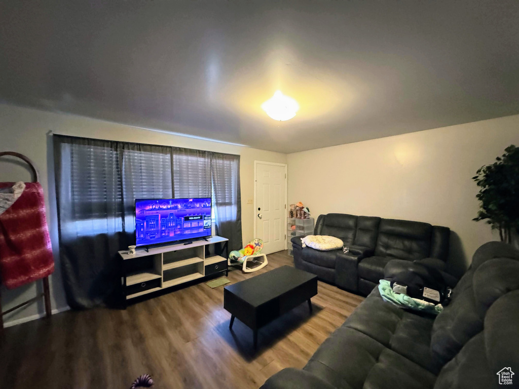 Living room featuring hardwood / wood-style flooring