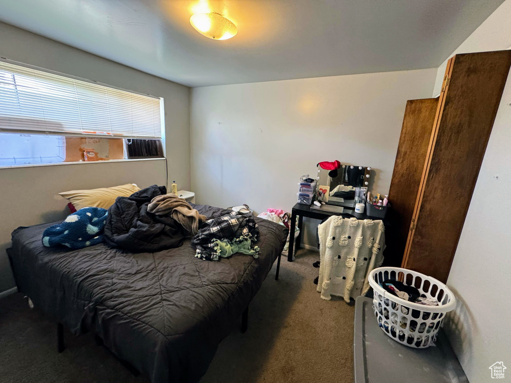 Bedroom with carpet