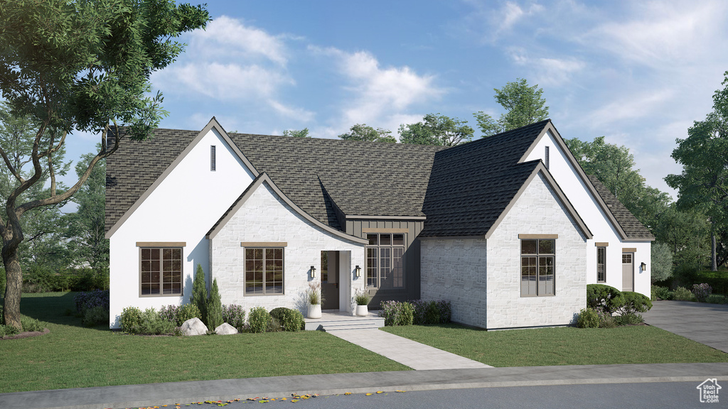 View of front of property featuring a front yard