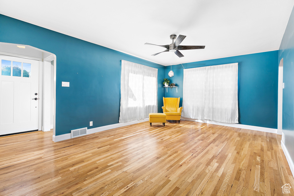 Unfurnished room featuring light hardwood / wood-style flooring and ceiling fan