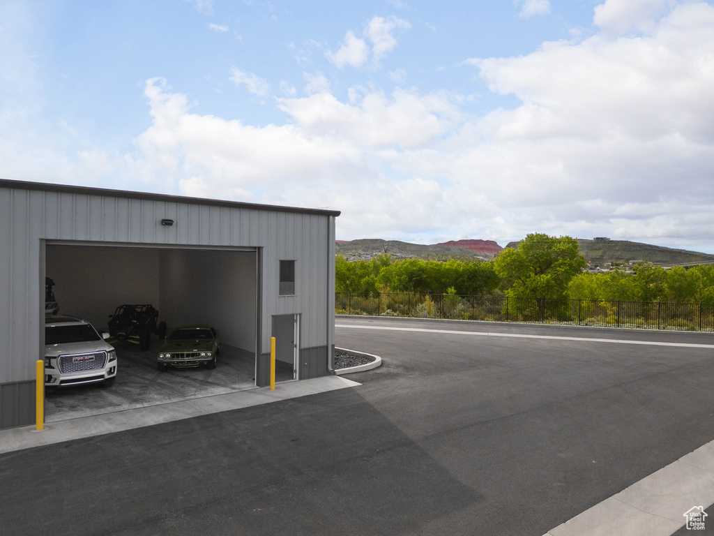 Garage featuring a mountain view