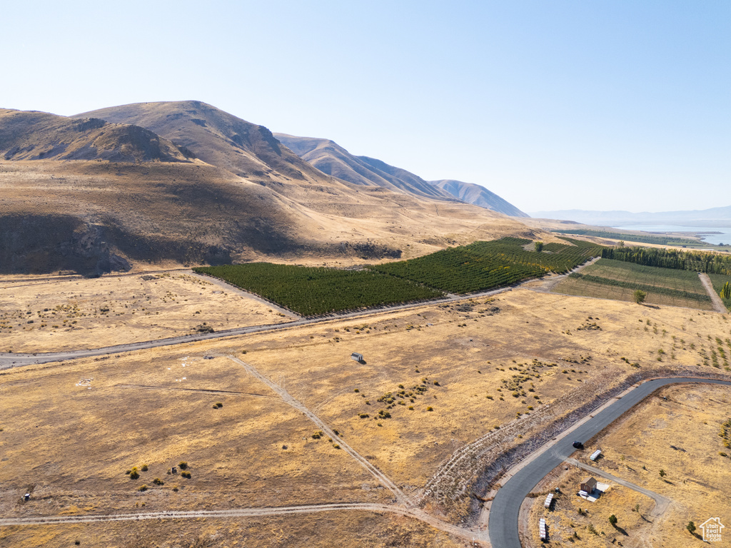 Property view of mountains with a rural view