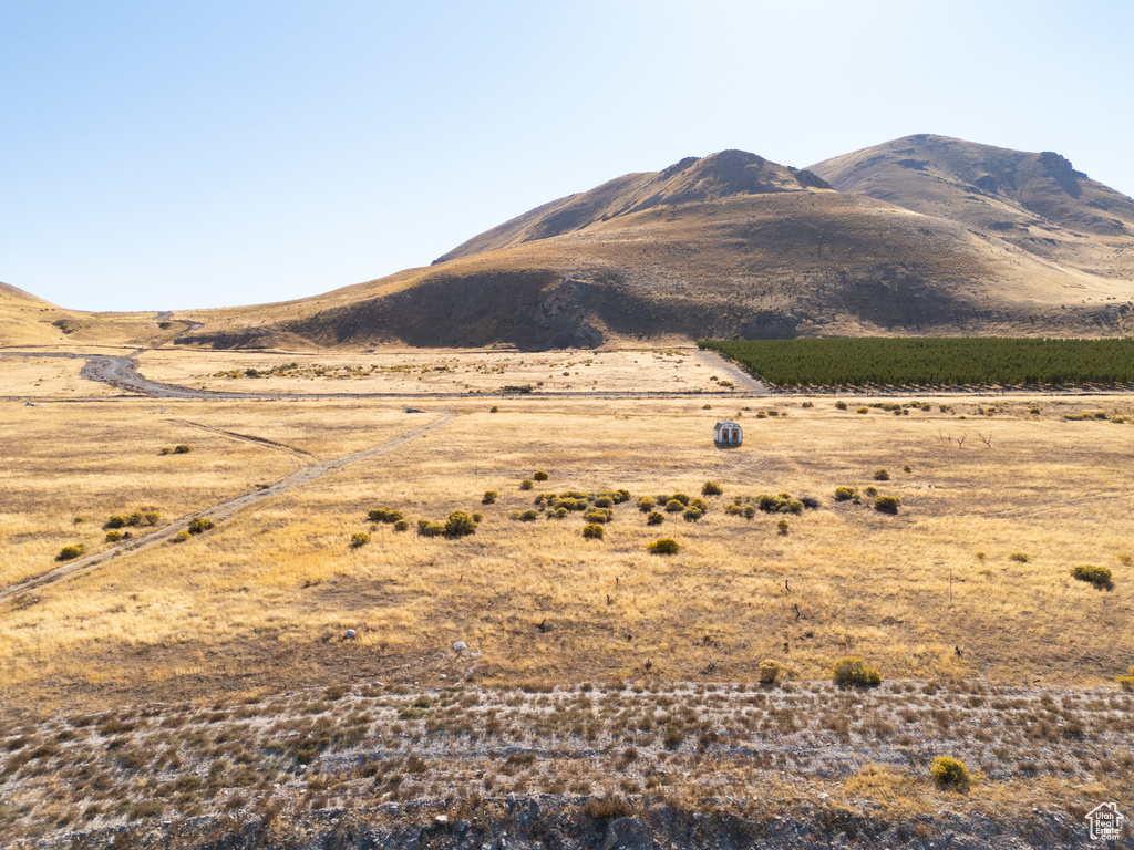 Property view of mountains featuring a rural view