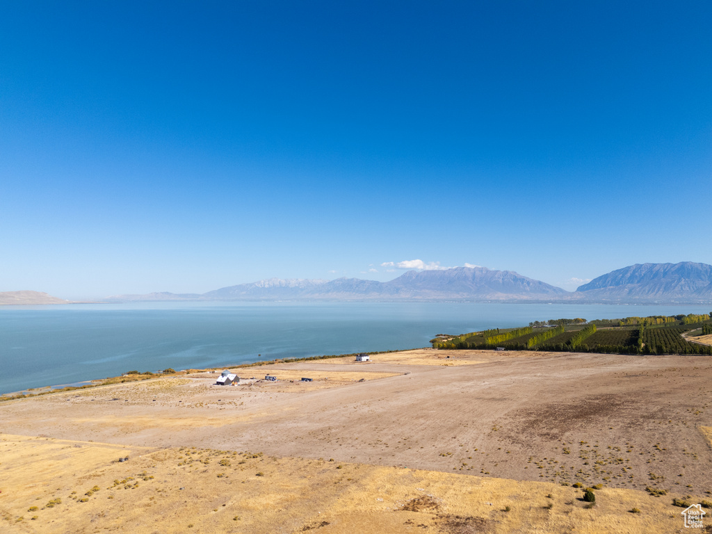 View of water feature with a mountain view