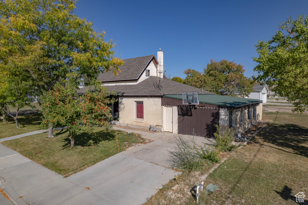 Exterior space with a lawn