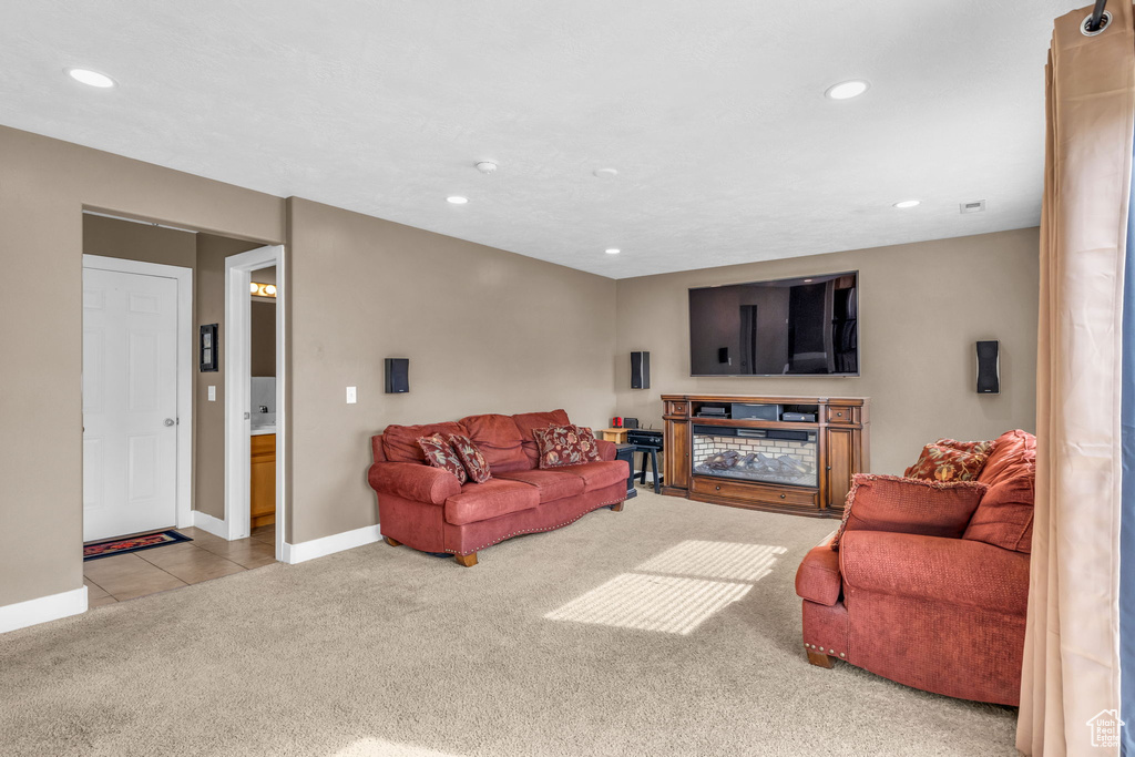 Living room featuring light colored carpet