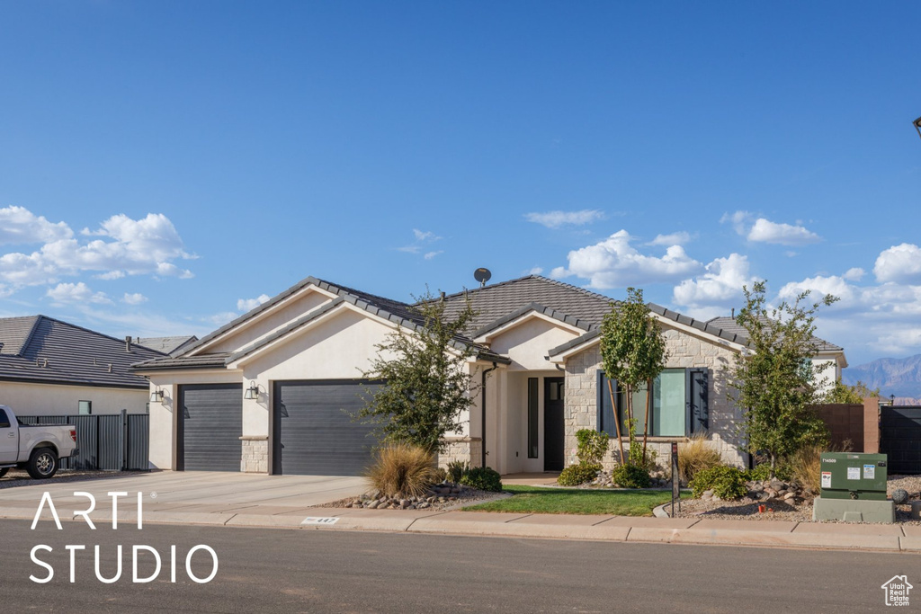 View of front of house with a garage