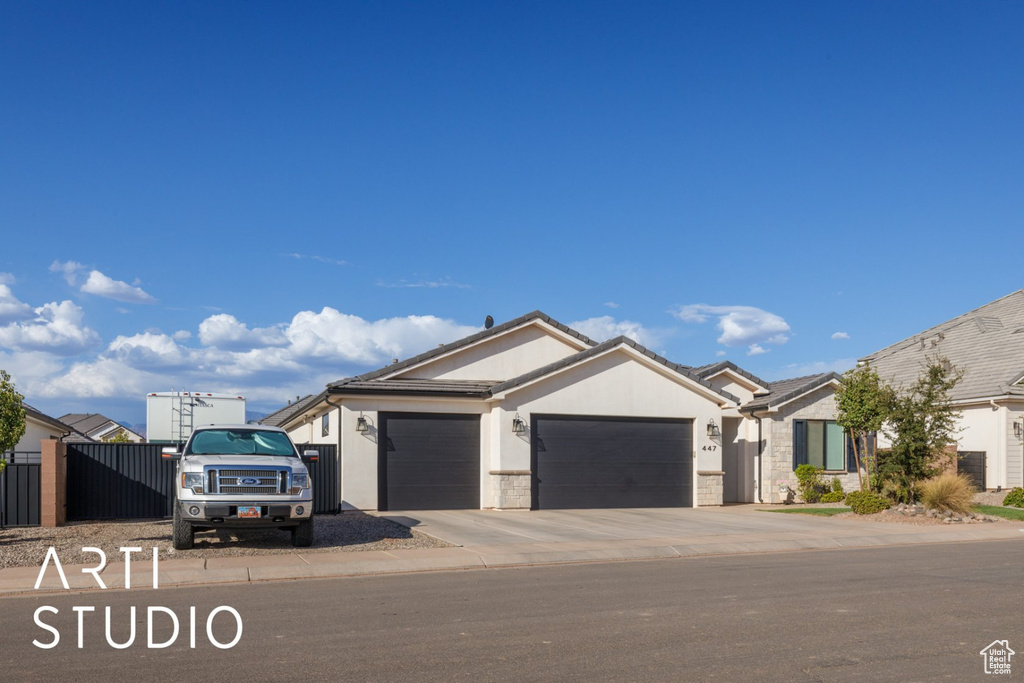 View of front of property with a garage