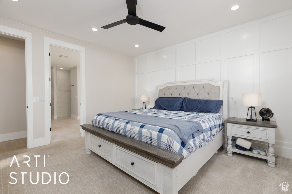 Bedroom featuring ceiling fan and light colored carpet