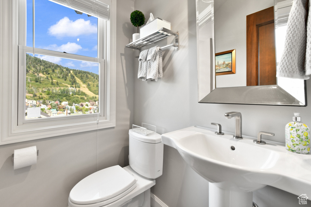 Bathroom with sink and toilet