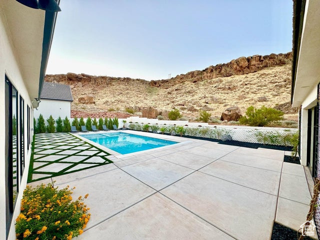 View of pool featuring a patio area