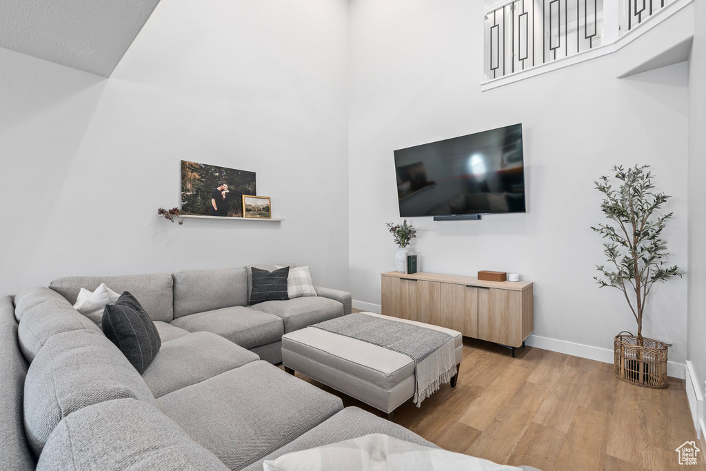 Living room with light wood-type flooring