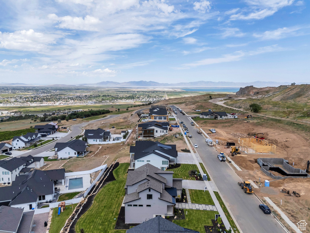 View of property location featuring a mountainous background and nearby suburban area
