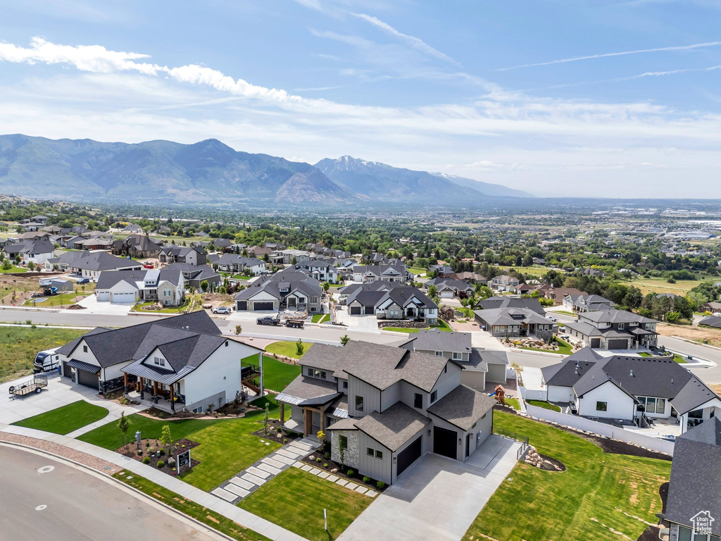 Aerial view of residential area with a mountain backdrop