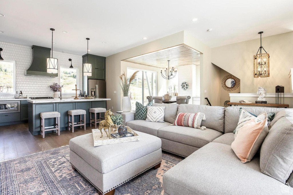 Living room with dark hardwood / wood-style flooring