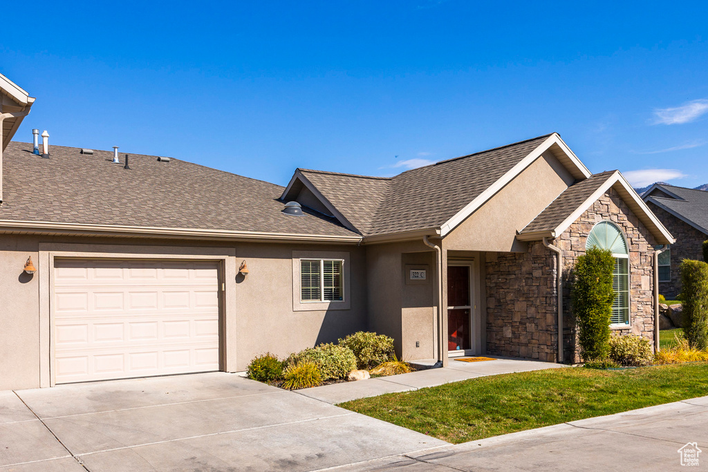 Ranch-style house with a garage