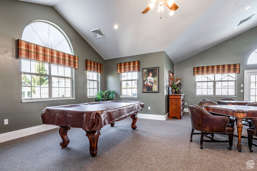 Recreation room featuring billiards, light carpet, a healthy amount of sunlight, and vaulted ceiling