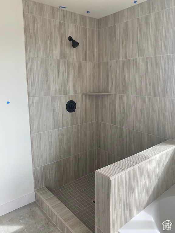 Bathroom with tiled shower