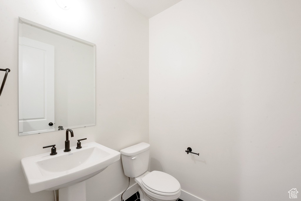 Bathroom with toilet and sink