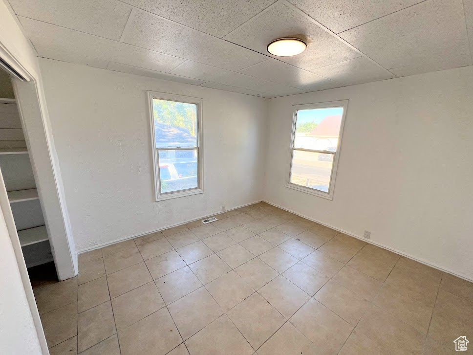 View of tiled spare room