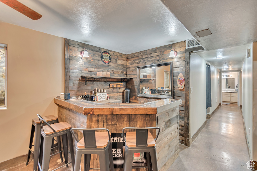 Interior space featuring a textured ceiling