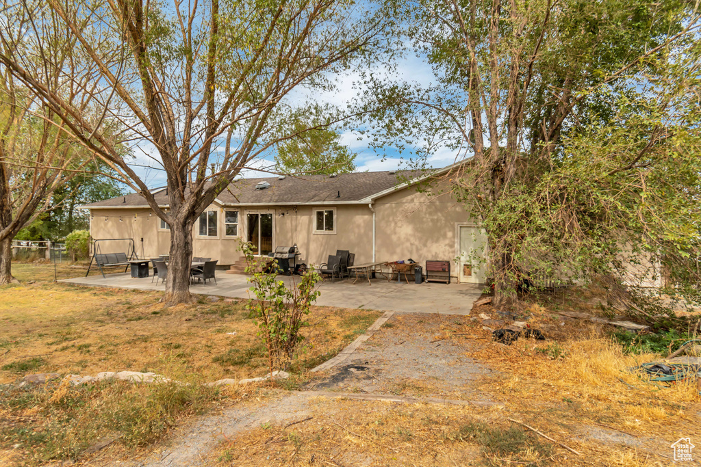 Back of house featuring a patio area