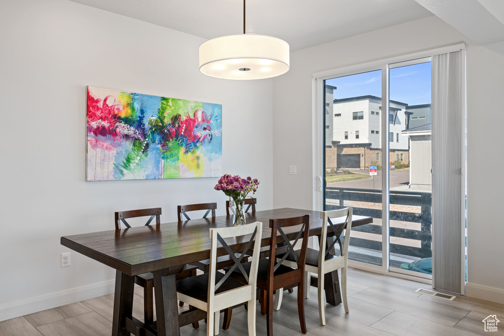 Dining area featuring hardwood / wood-style floors