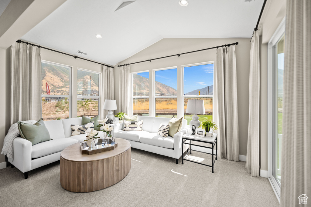 Sunroom / solarium with vaulted ceiling