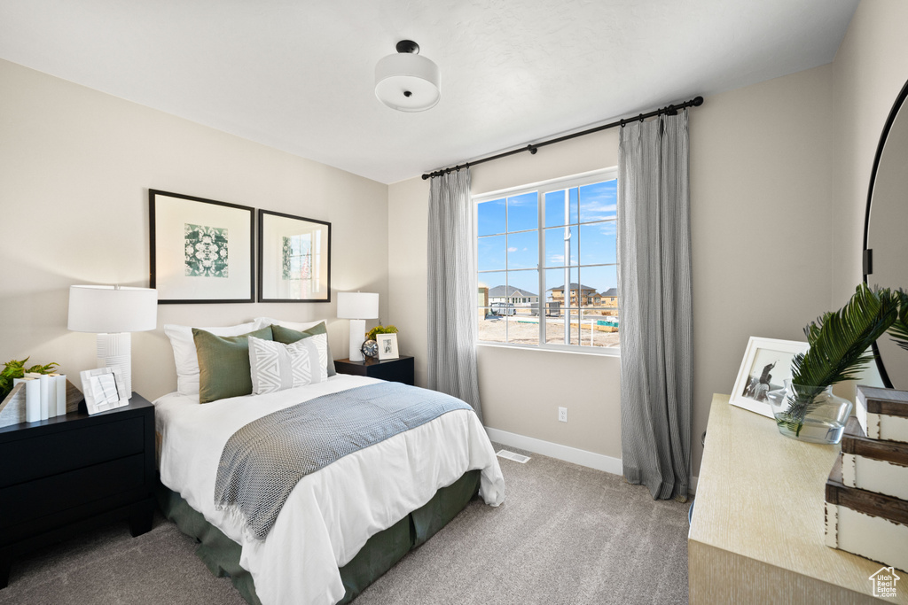 View of carpeted bedroom