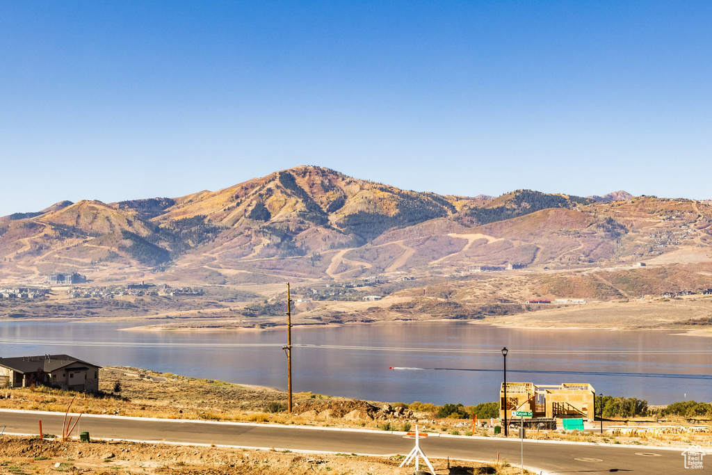 Mountain view featuring a water view