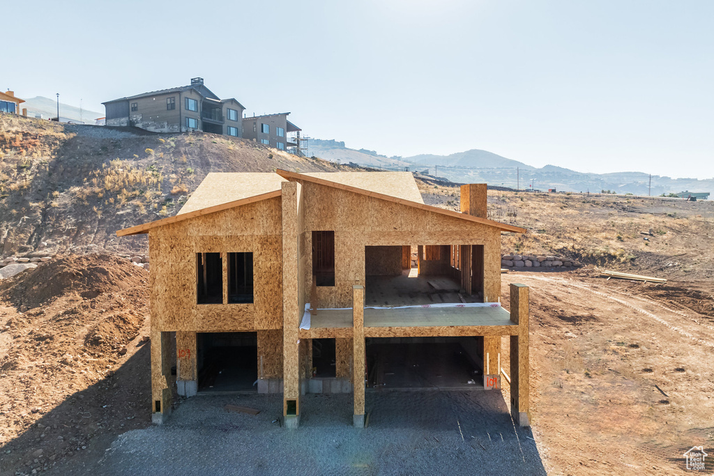 View of front of house featuring a mountain view