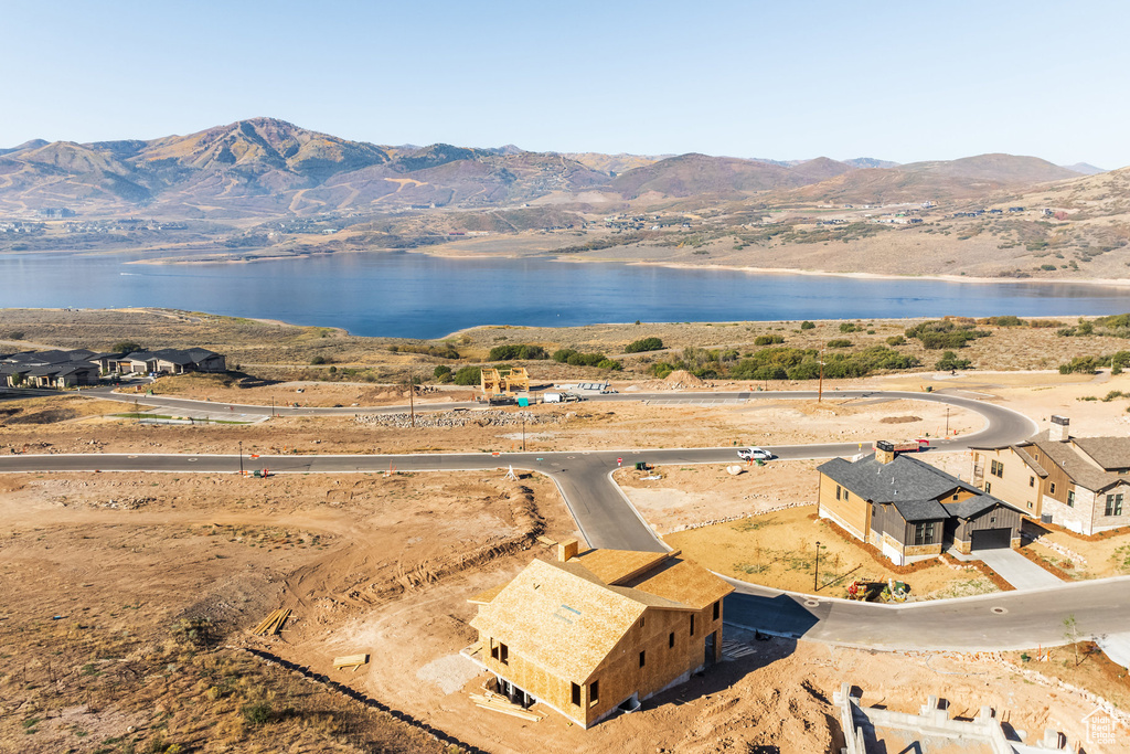 Bird's eye view featuring a water and mountain view