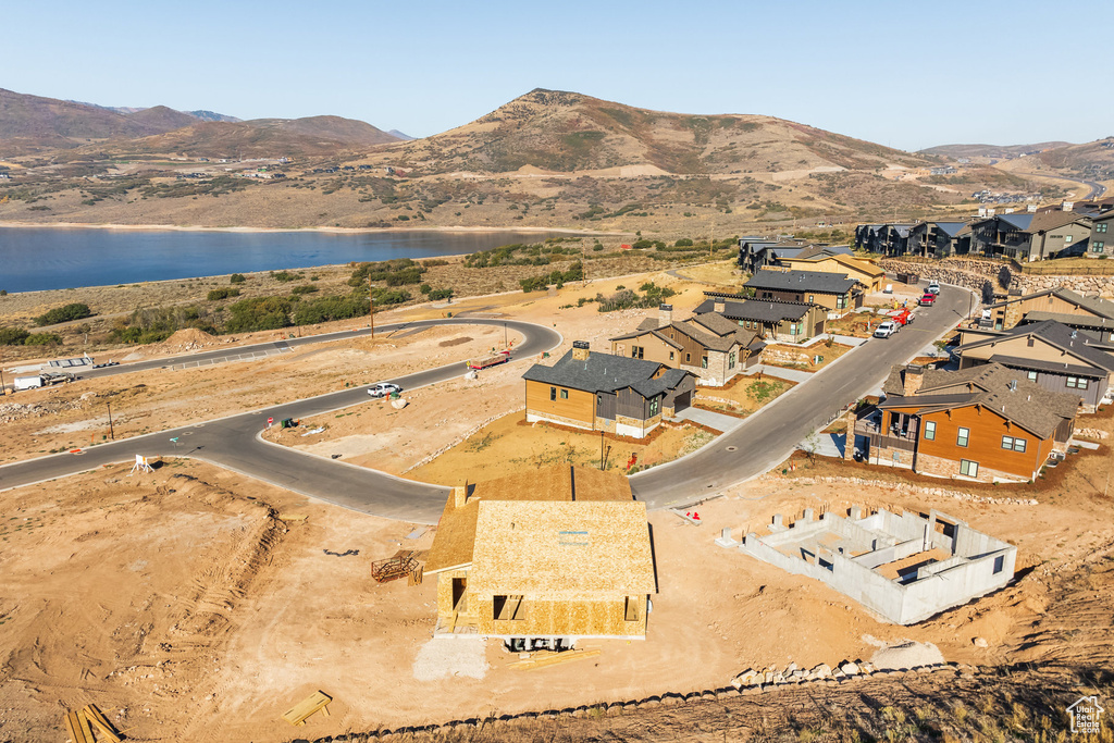 Bird's eye view with a water and mountain view