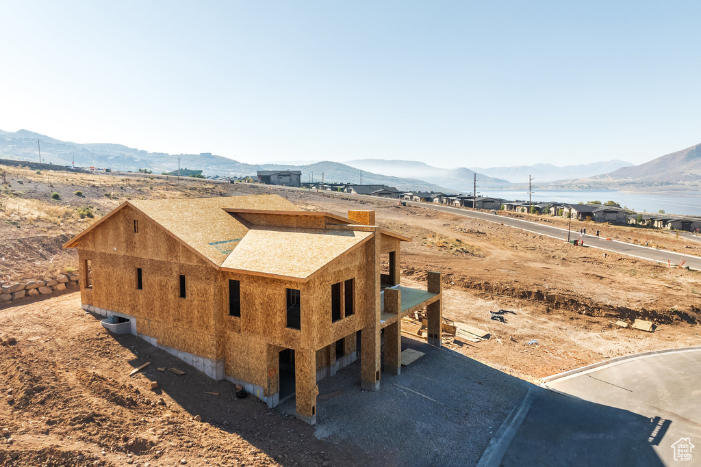 Exterior space featuring a mountain view and central air condition unit