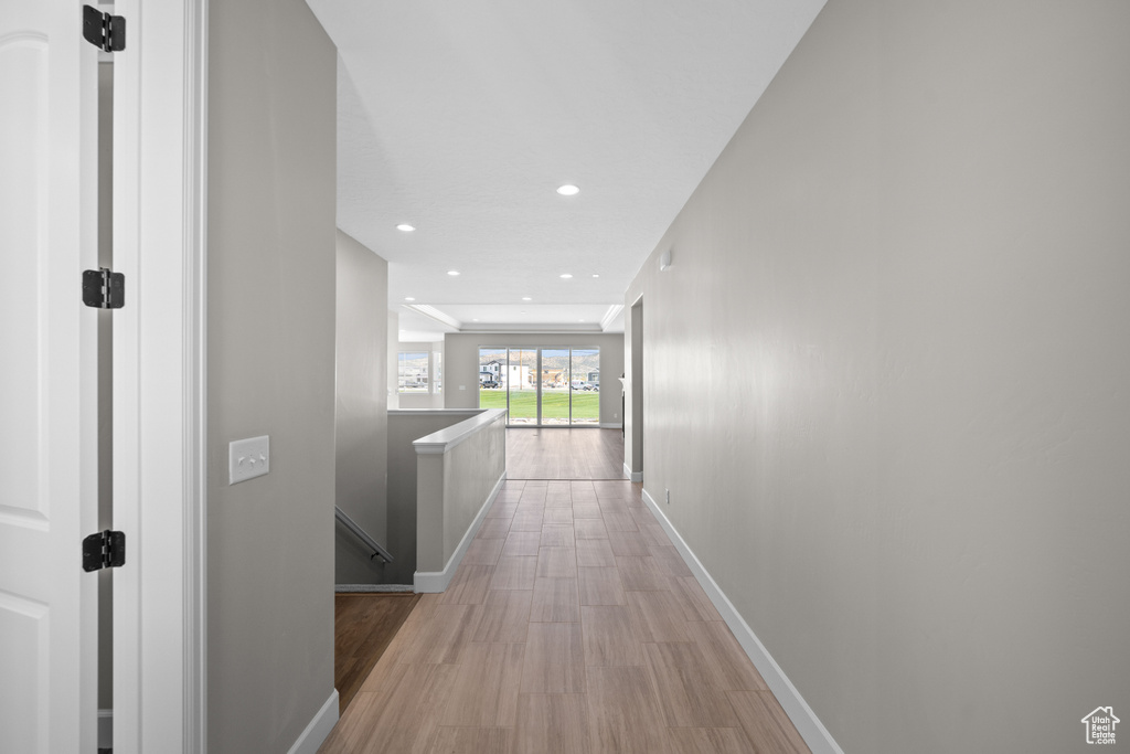 Corridor featuring light hardwood / wood-style floors