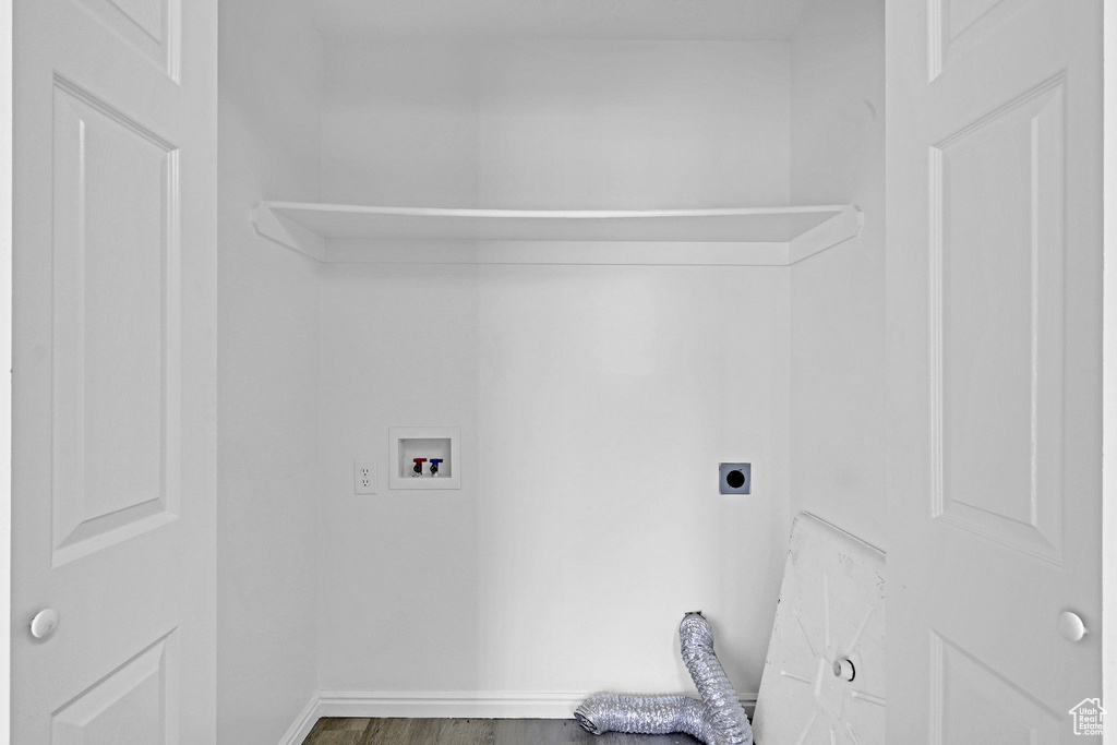 Washroom featuring washer hookup, wood-type flooring, and electric dryer hookup