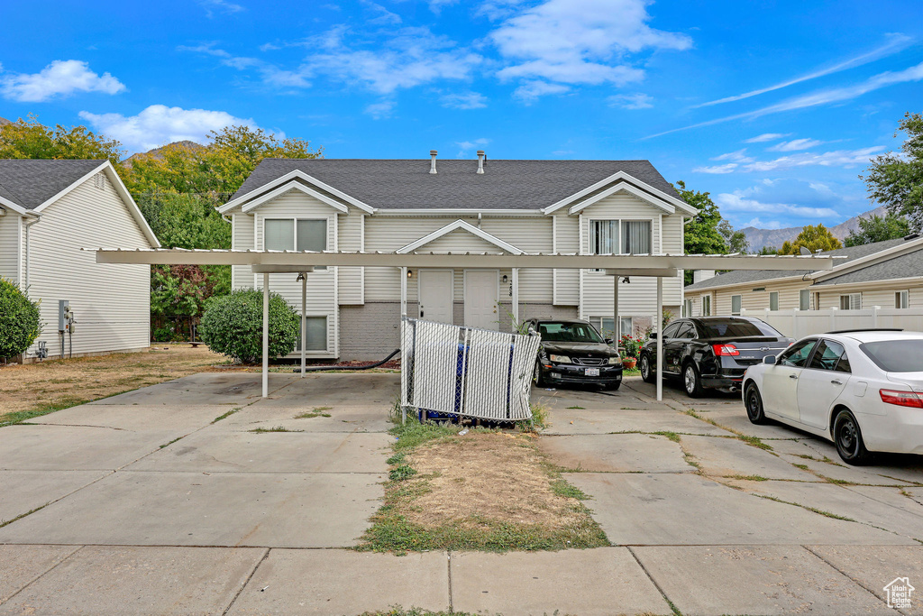 View of front of property with a mountain view